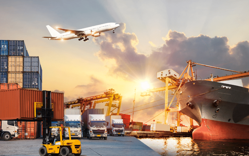 Composite scene of a cargo plane, stacked containers, trucks and a container ship at a port