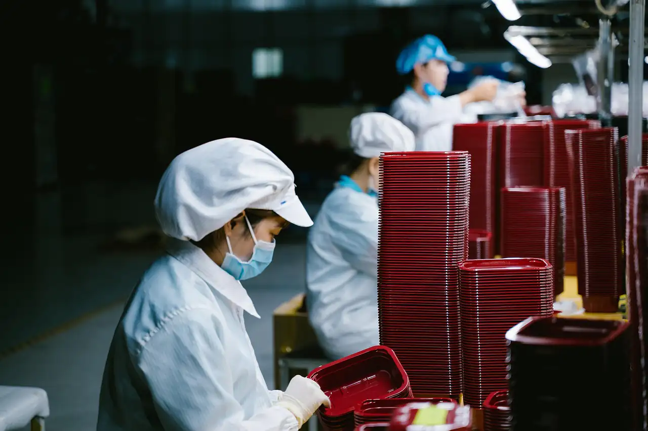 Workers on a production line in China