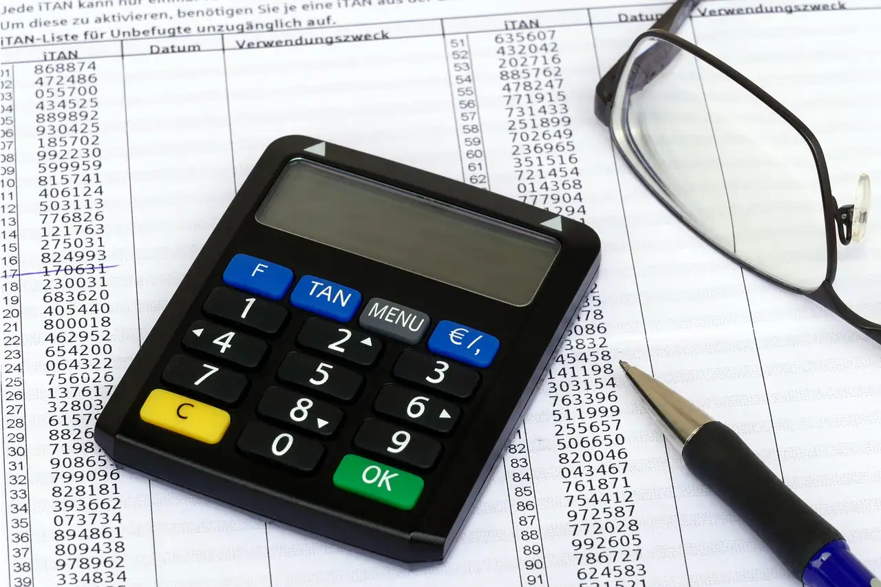 A calculator on a bank statement