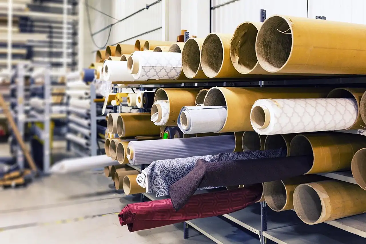 Fabric rolls on racks in a store