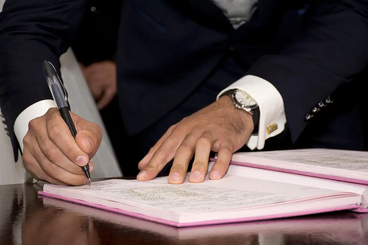 Signing an official document