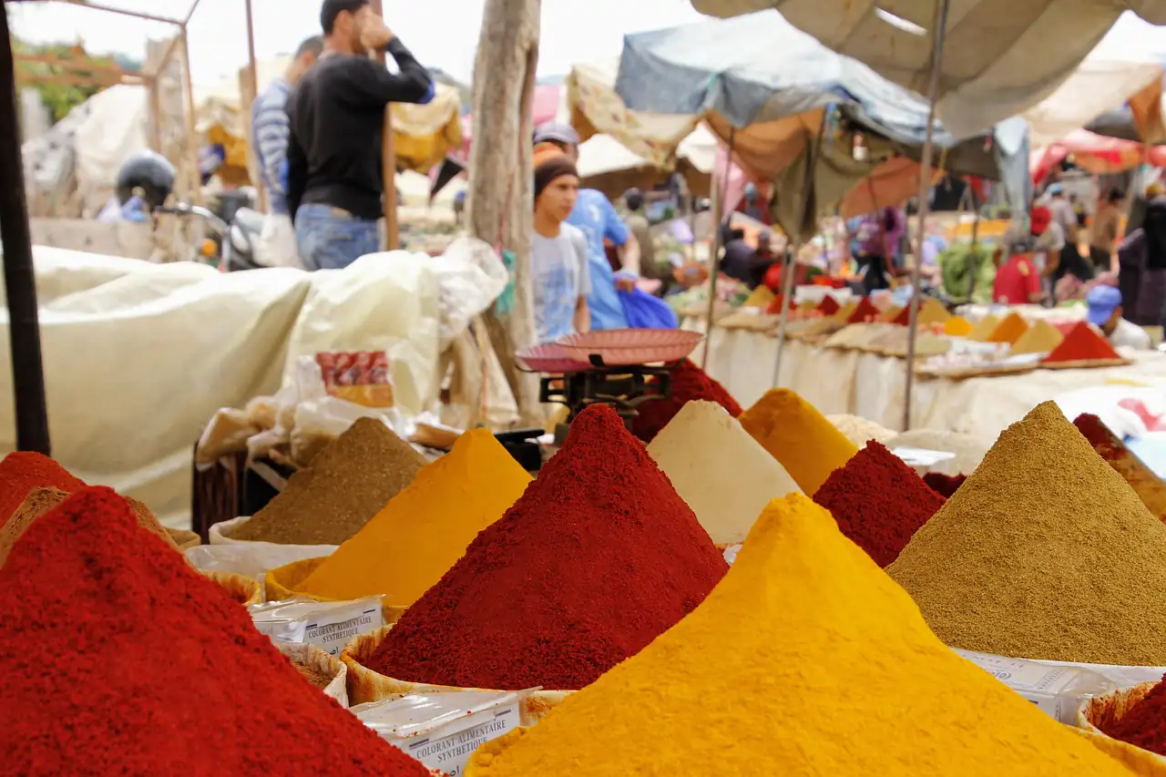 Heaps of ground spices at a market