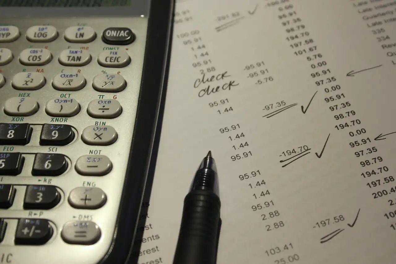 A calculator on a printed statement