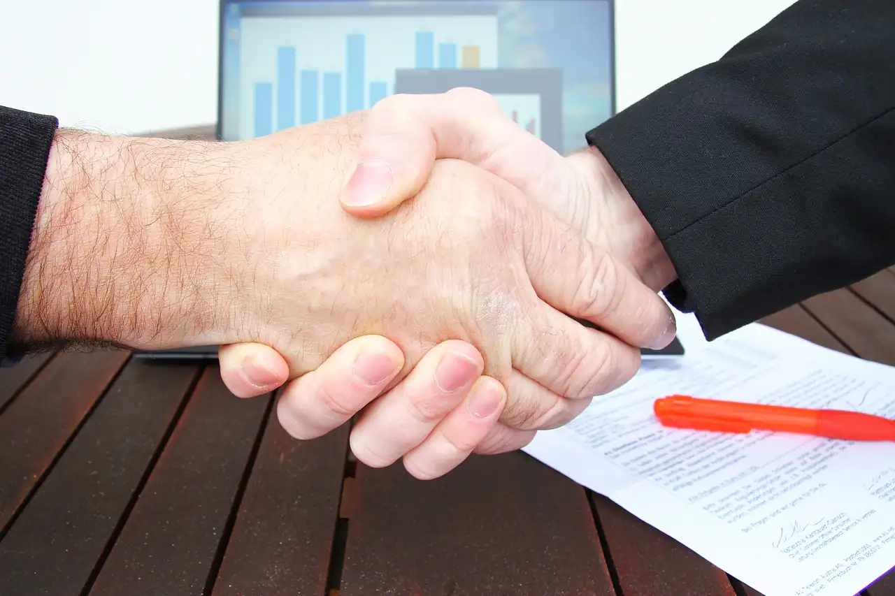 A handshake over a signed paper