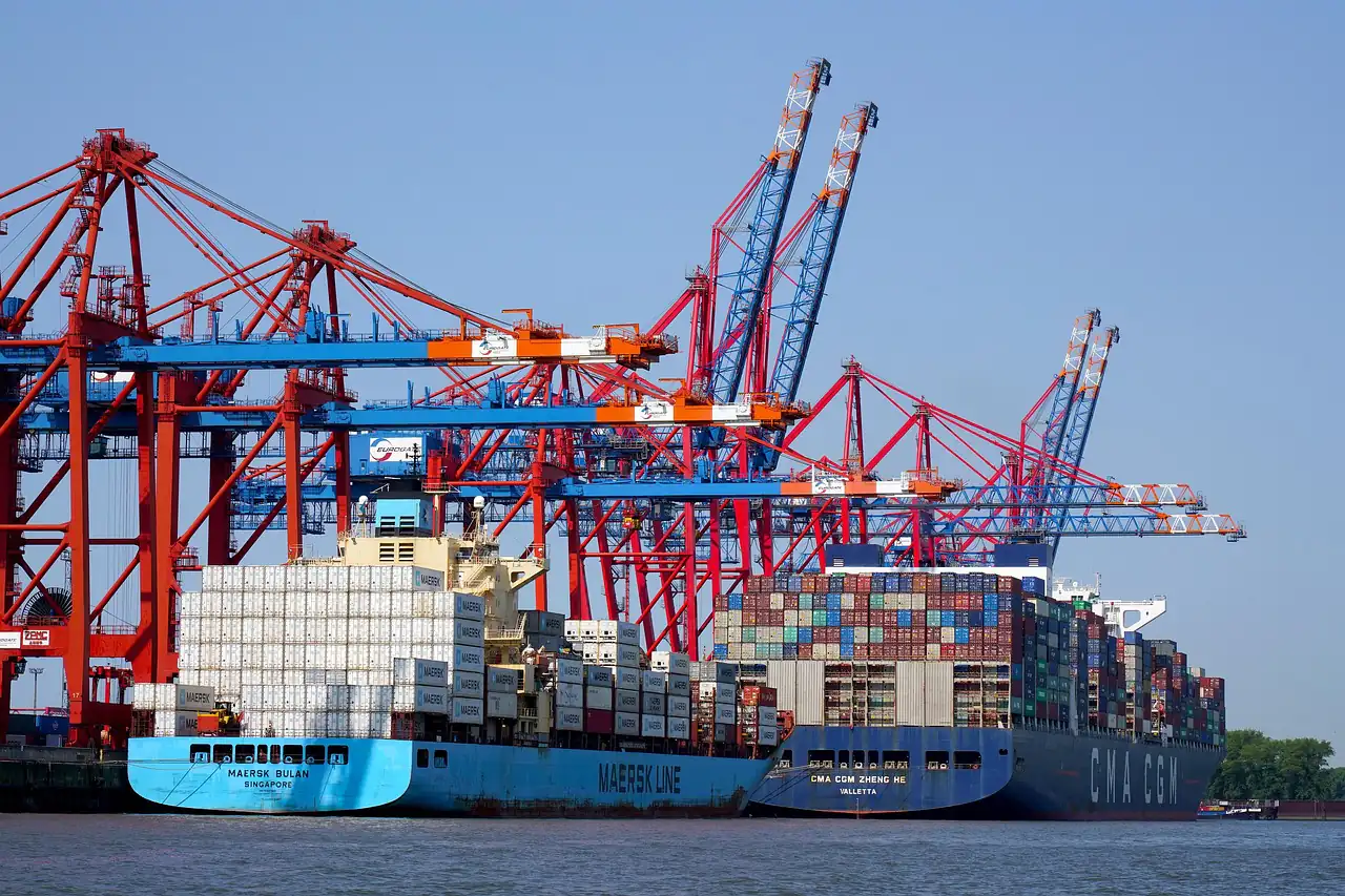 Gantry cranes loading a container ship