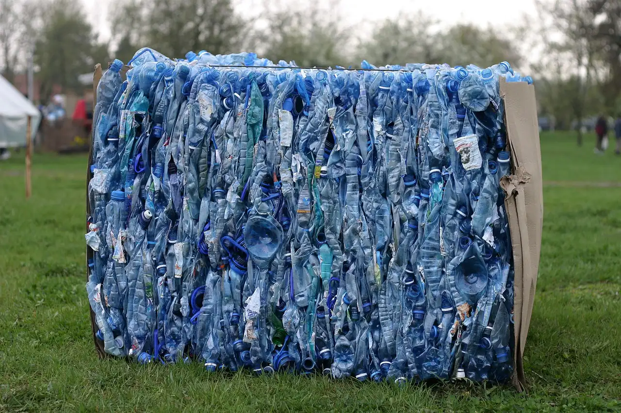A bale of crushed plastic bottles ready for recycling