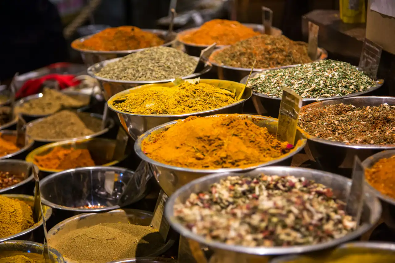 Bowls of spices at a market stall