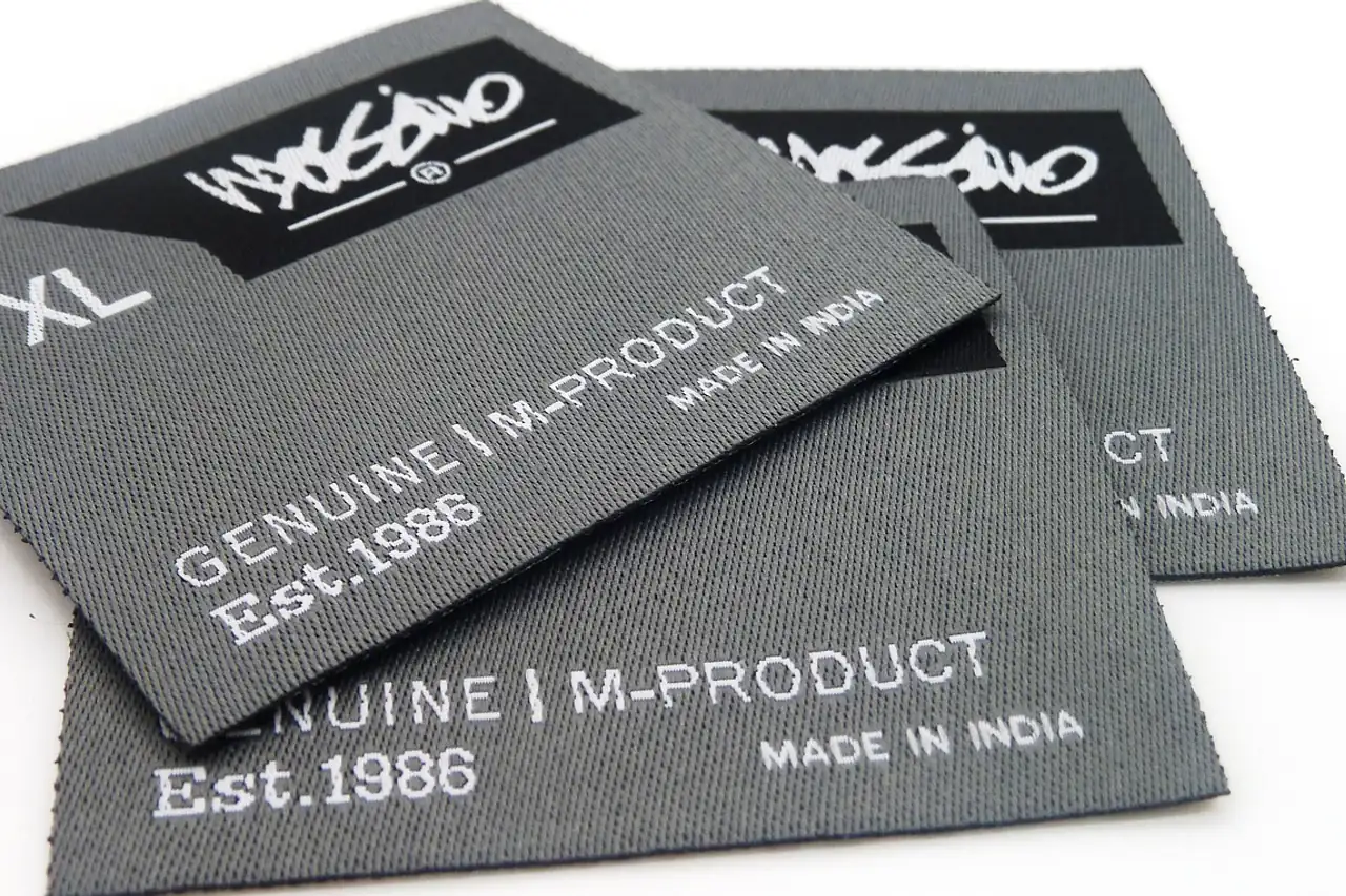 Woven garment labels reading made in India