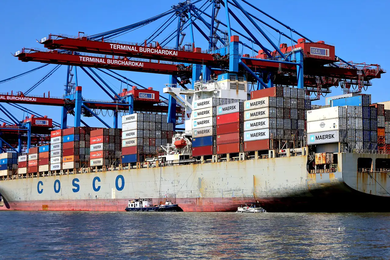 Cranes unloading containers from a ship at a terminal