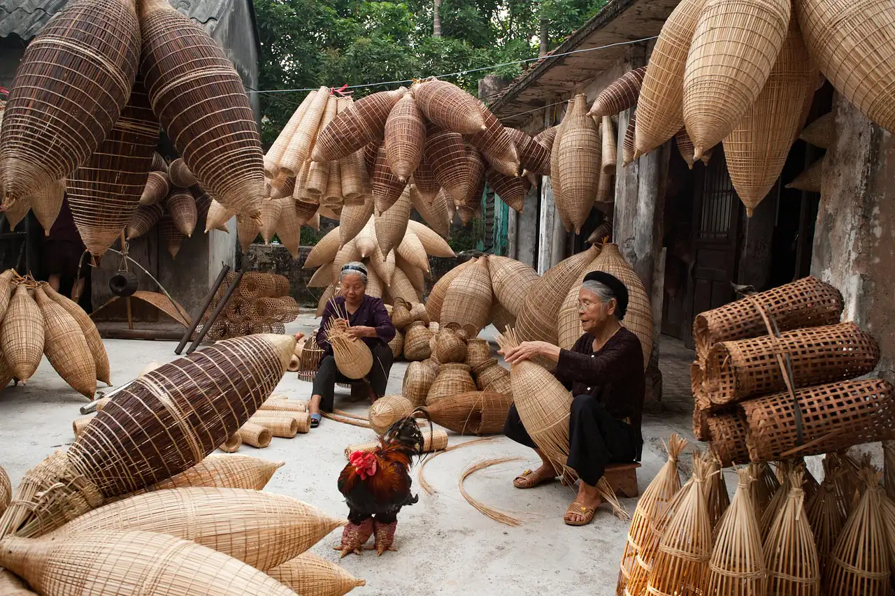 Artisans weaving bamboo and cane baskets