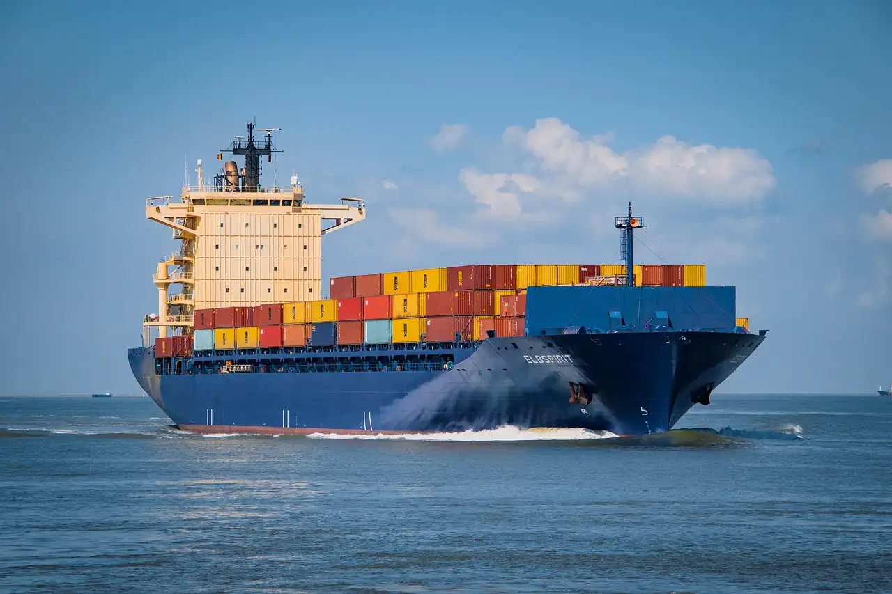 A loaded container ship at sea