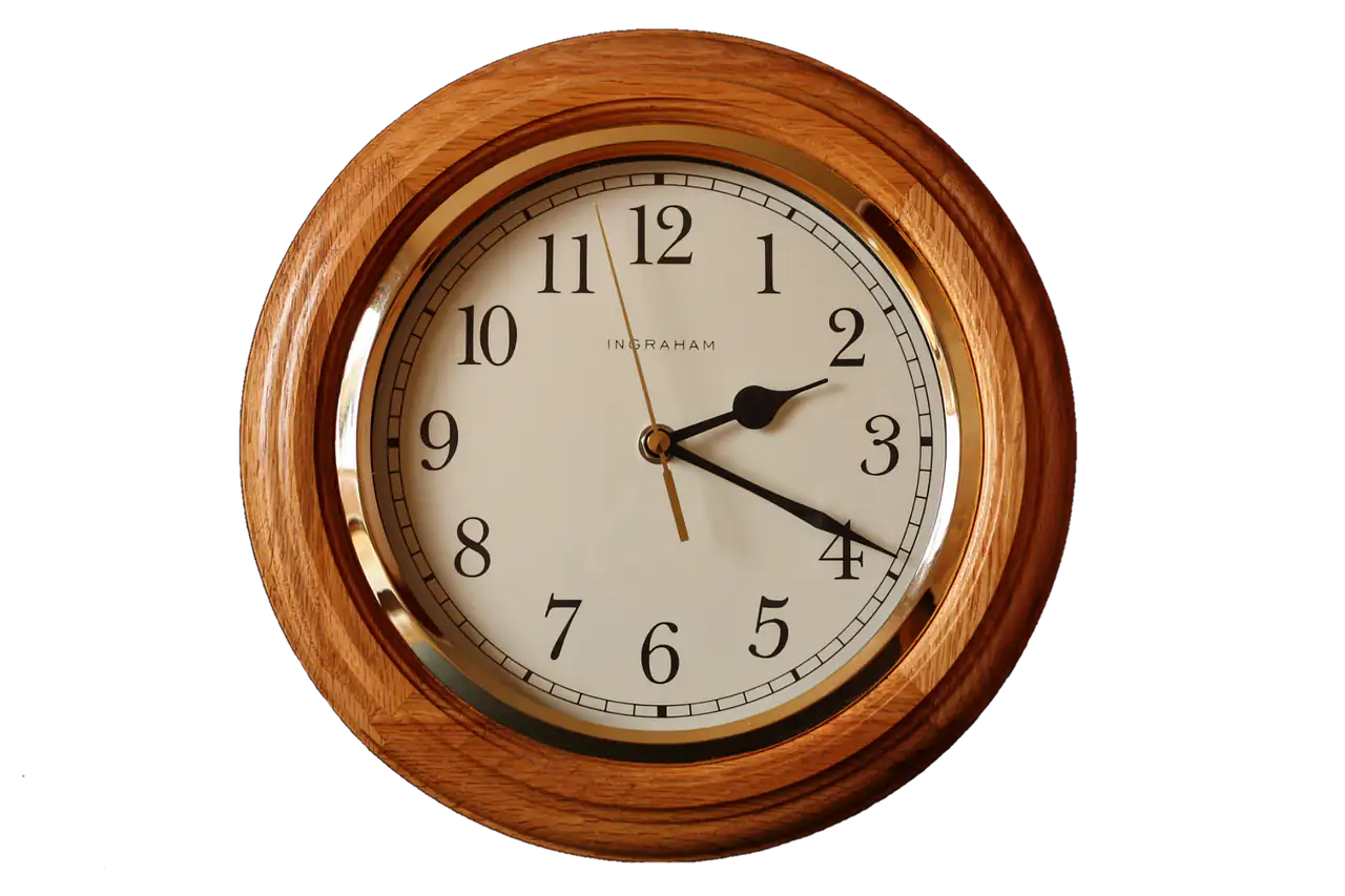A wooden wall clock