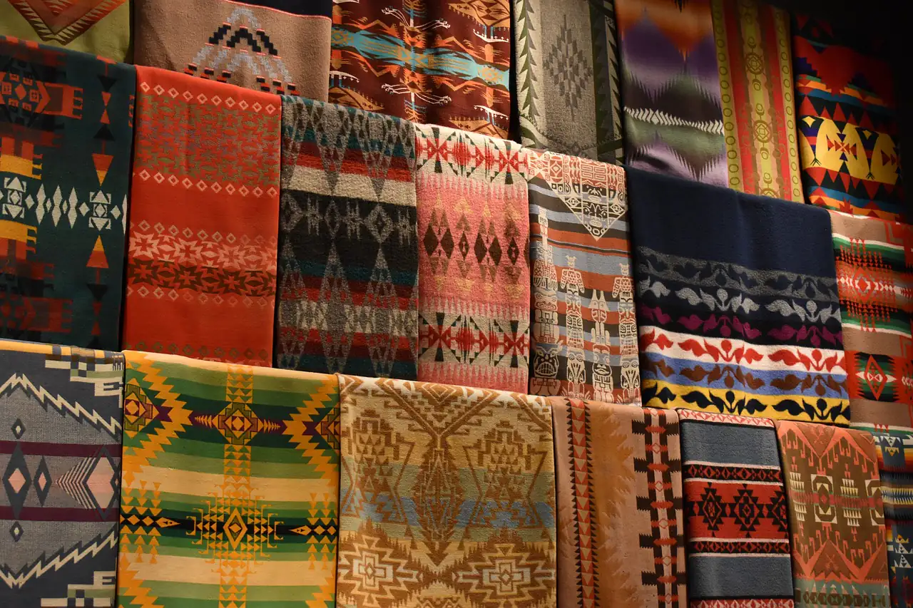 Woven rugs and throws on display