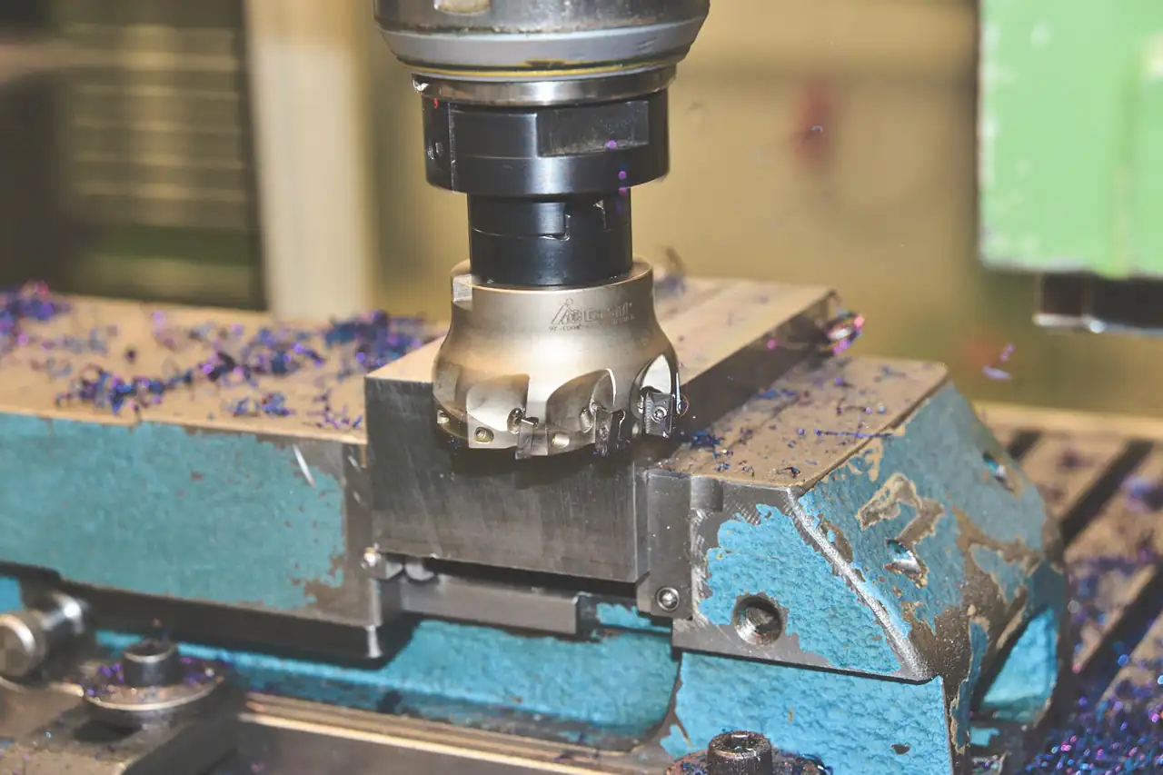 A milling cutter machining a part