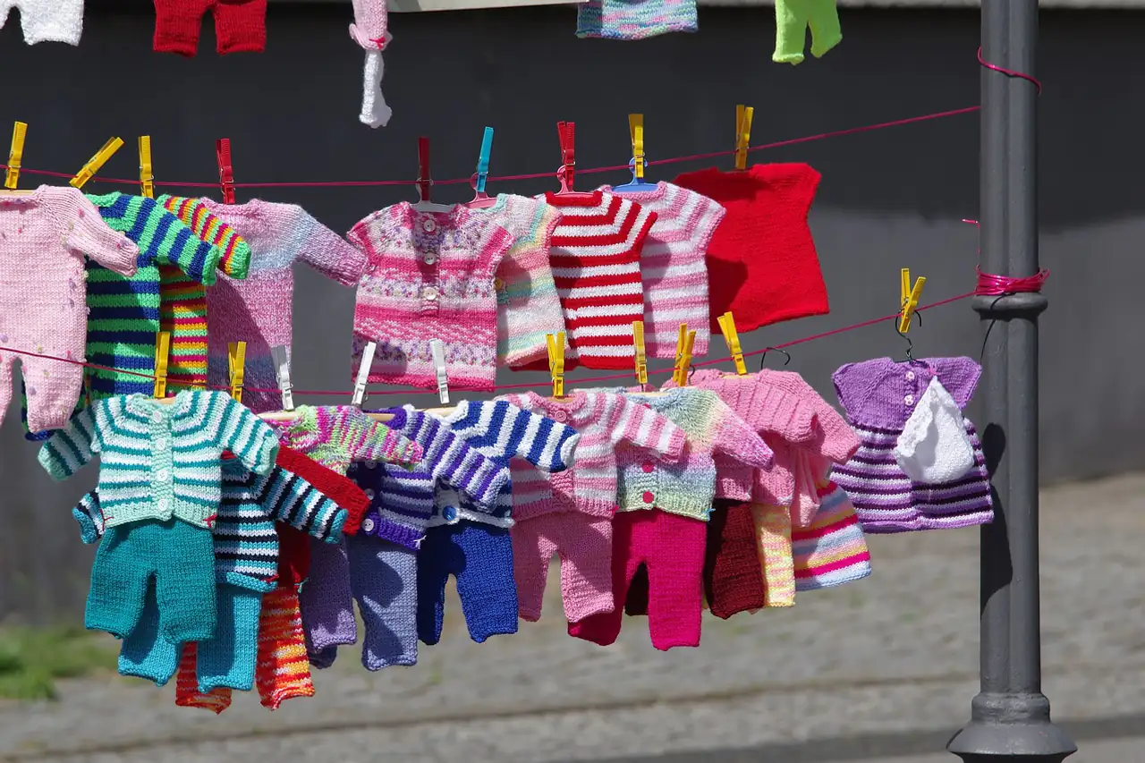 Children's knitwear hung out to dry