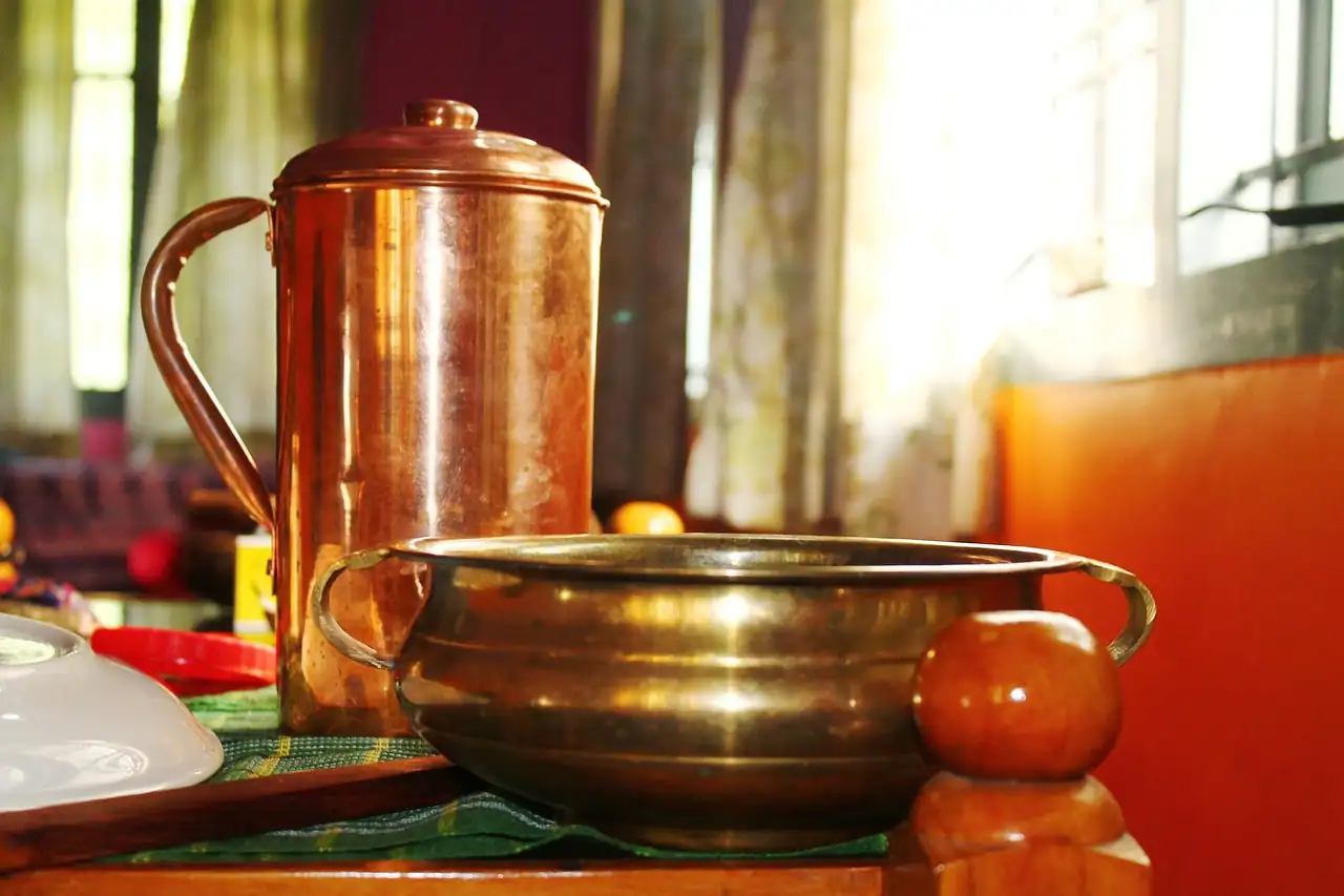 Copper and brass vessels in a kitchen