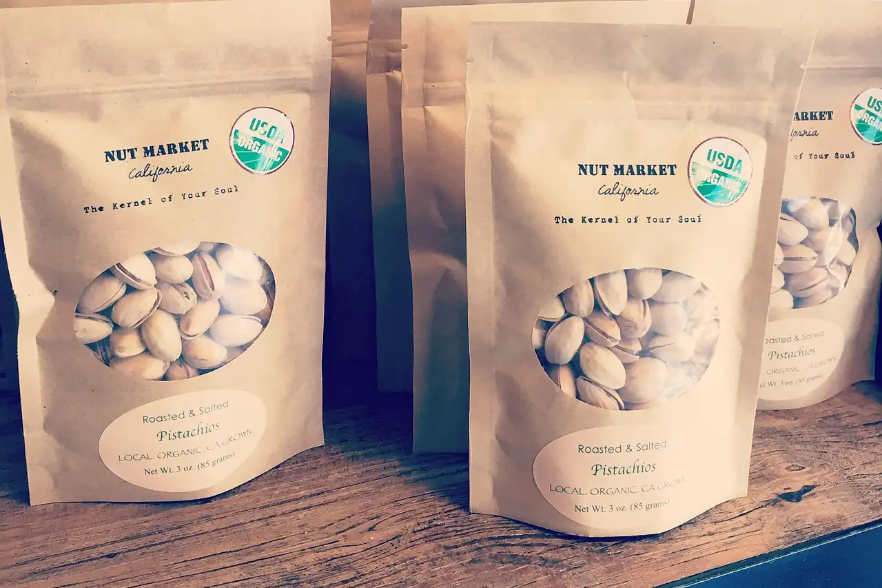 Nuts packed in branded retail pouches