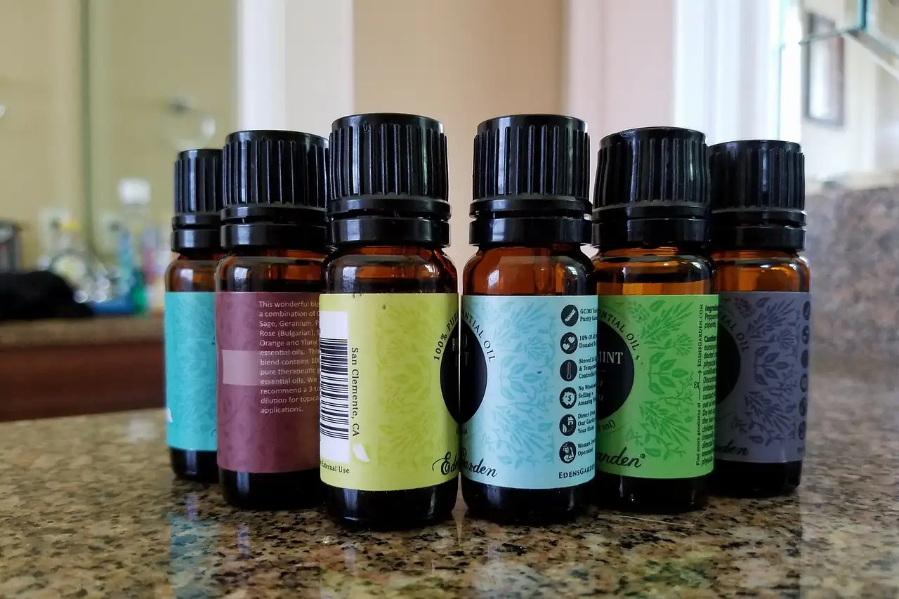 A row of small essential oil bottles