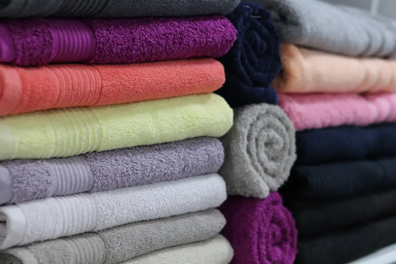 Stacked towels in different colours