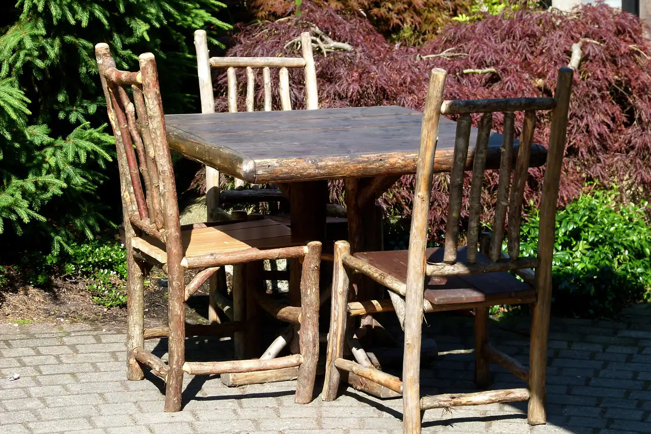 Rustic wooden chairs around a table