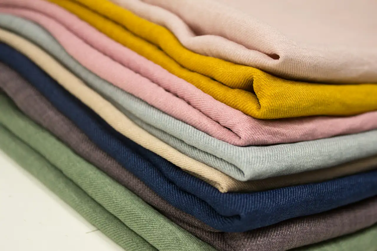Folded cotton fabrics in a range of colours