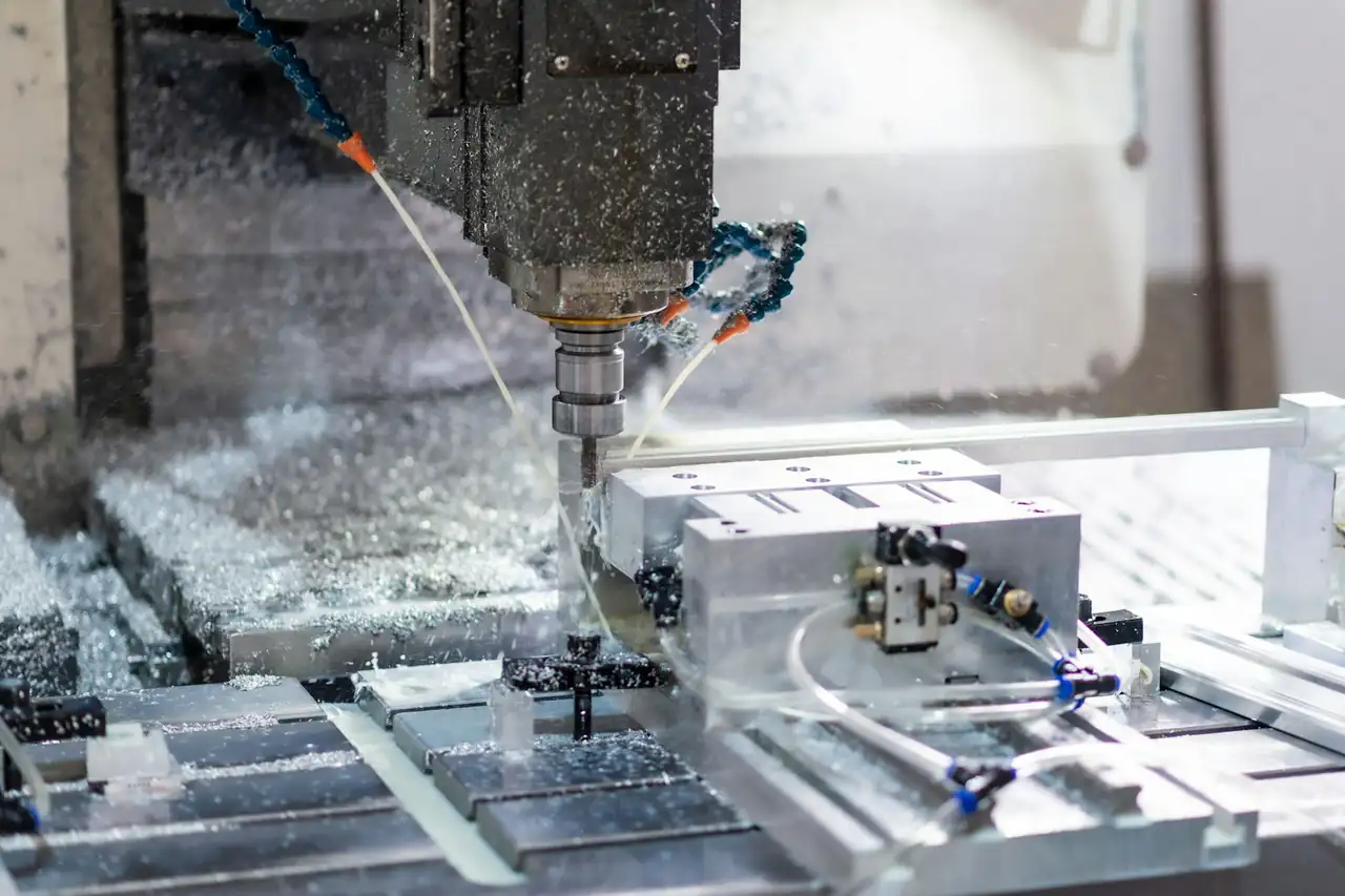 A CNC machine milling a metal part