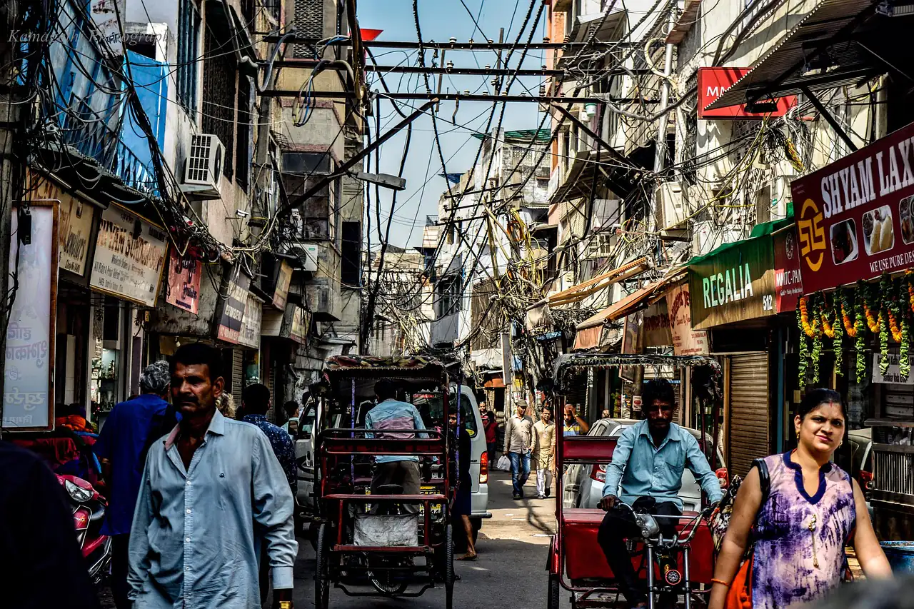 A busy shopping street in an Indian city