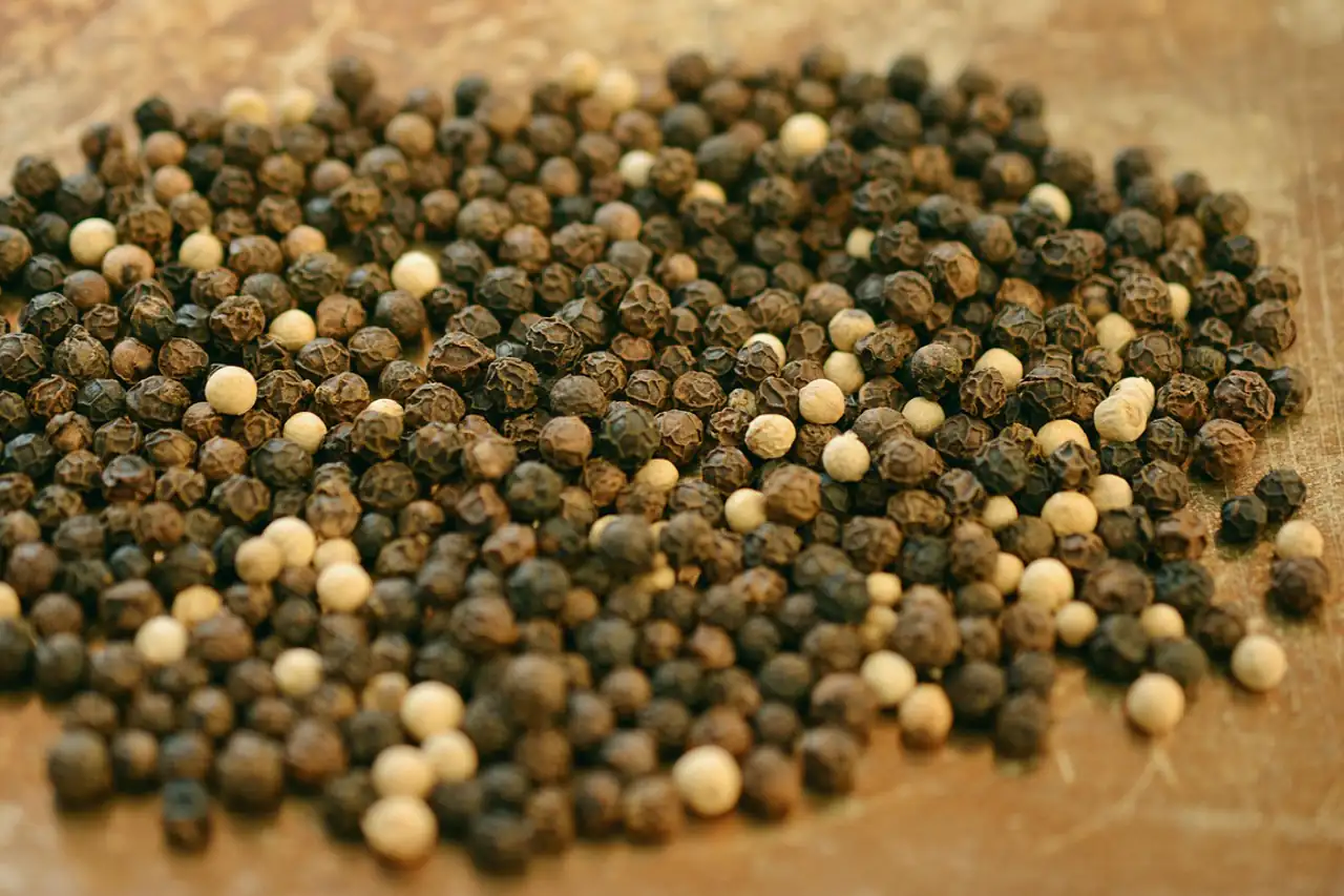 Whole black peppercorns