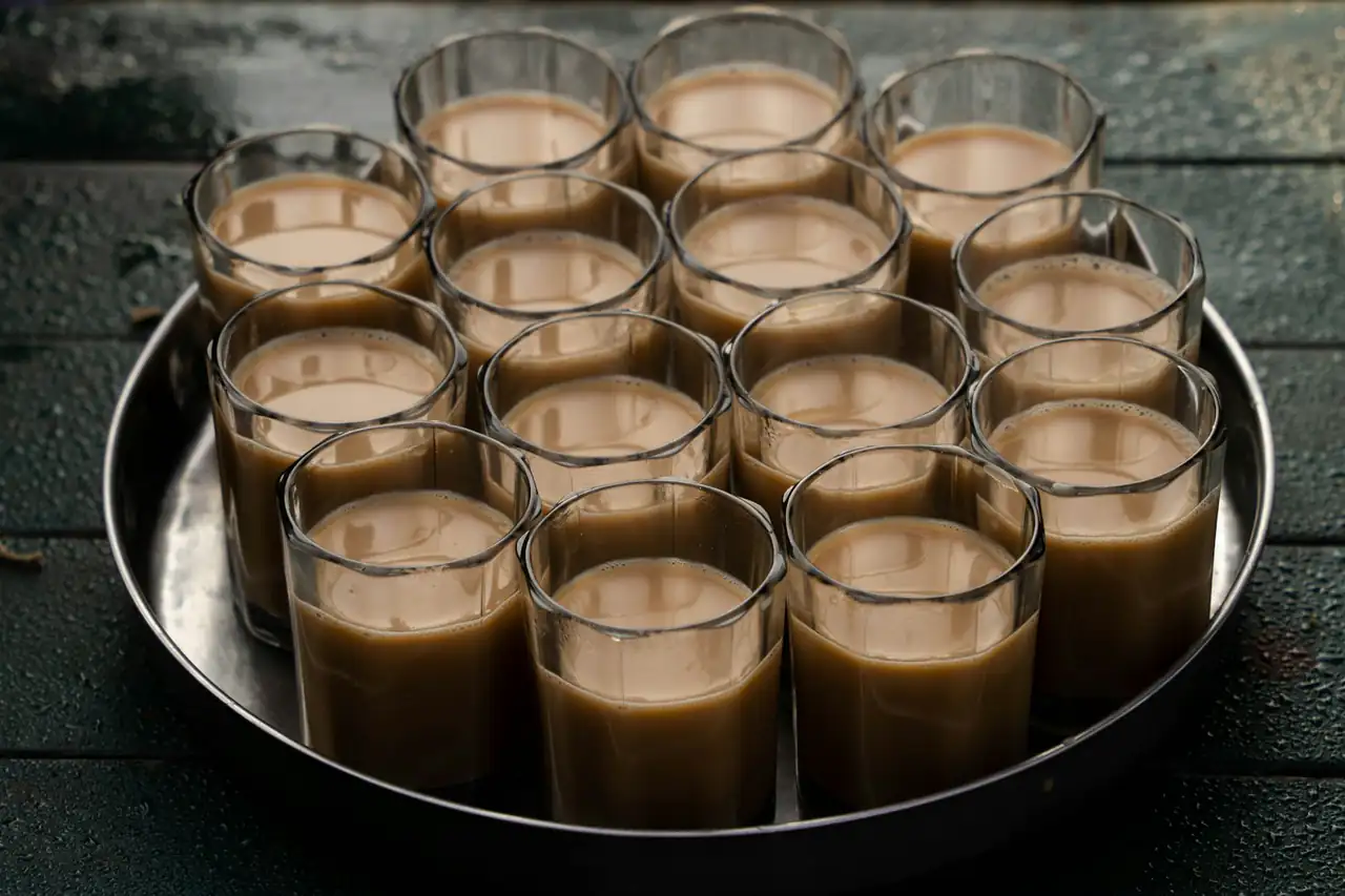 Glasses of chai on a tray