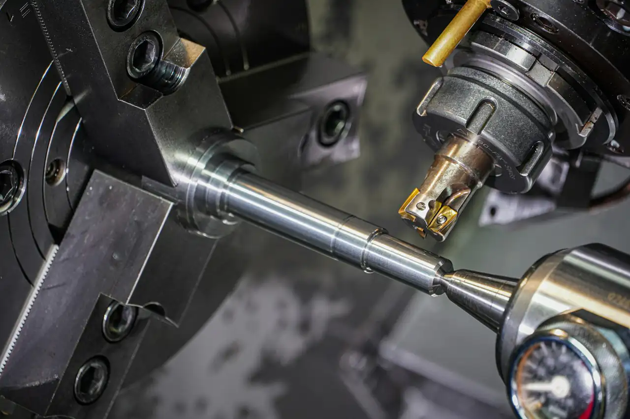 A lathe cutting a metal part
