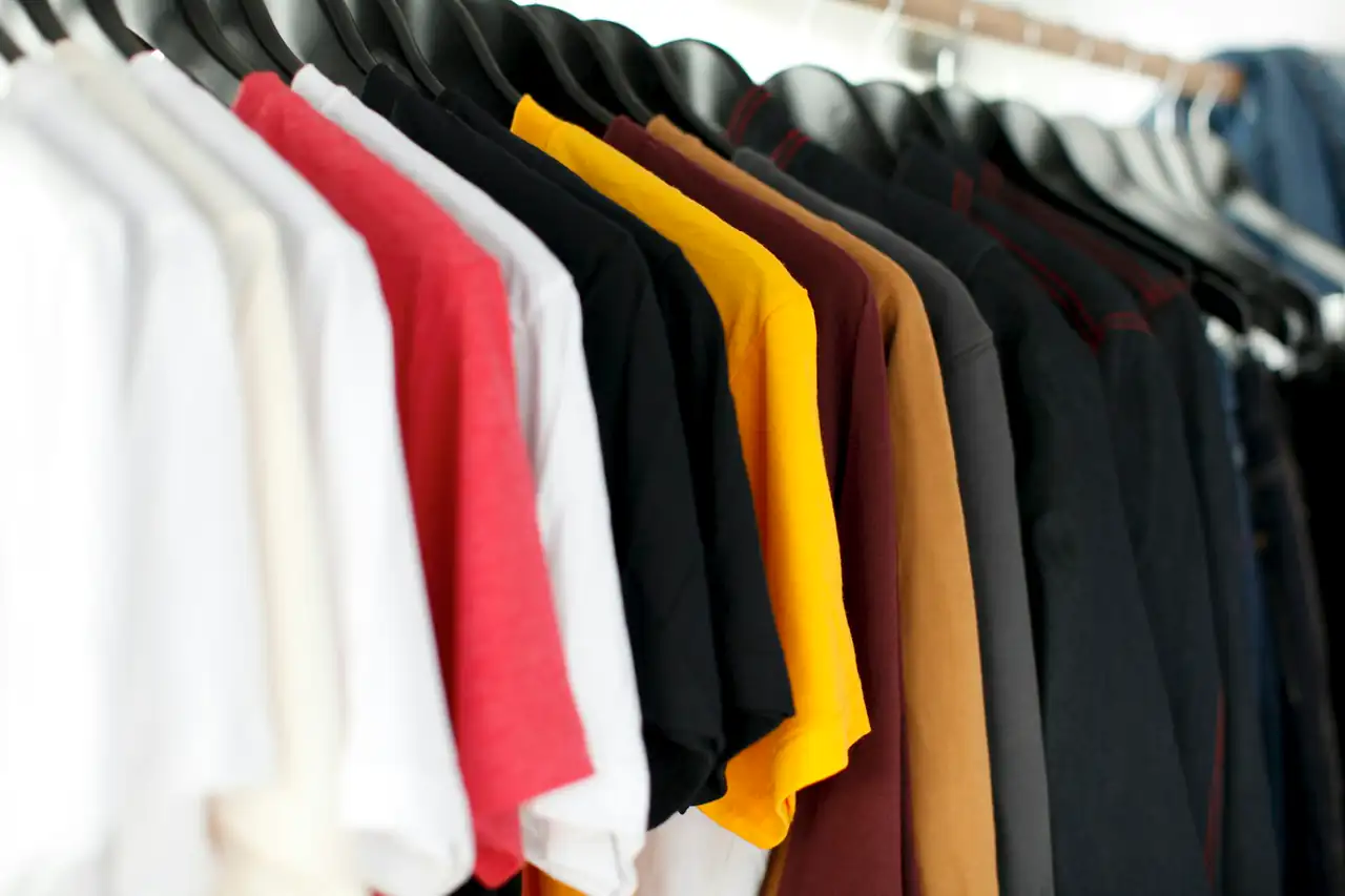T-shirts on hangers in a row