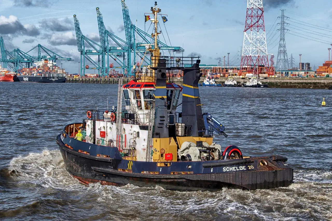A tug working in a busy port