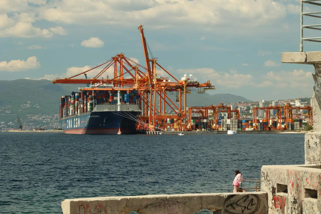 Container cranes at a terminal across the water