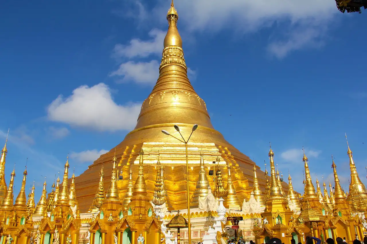 A golden pagoda under a blue sky