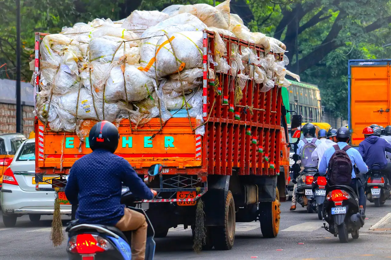 A loaded lorry in heavy traffic