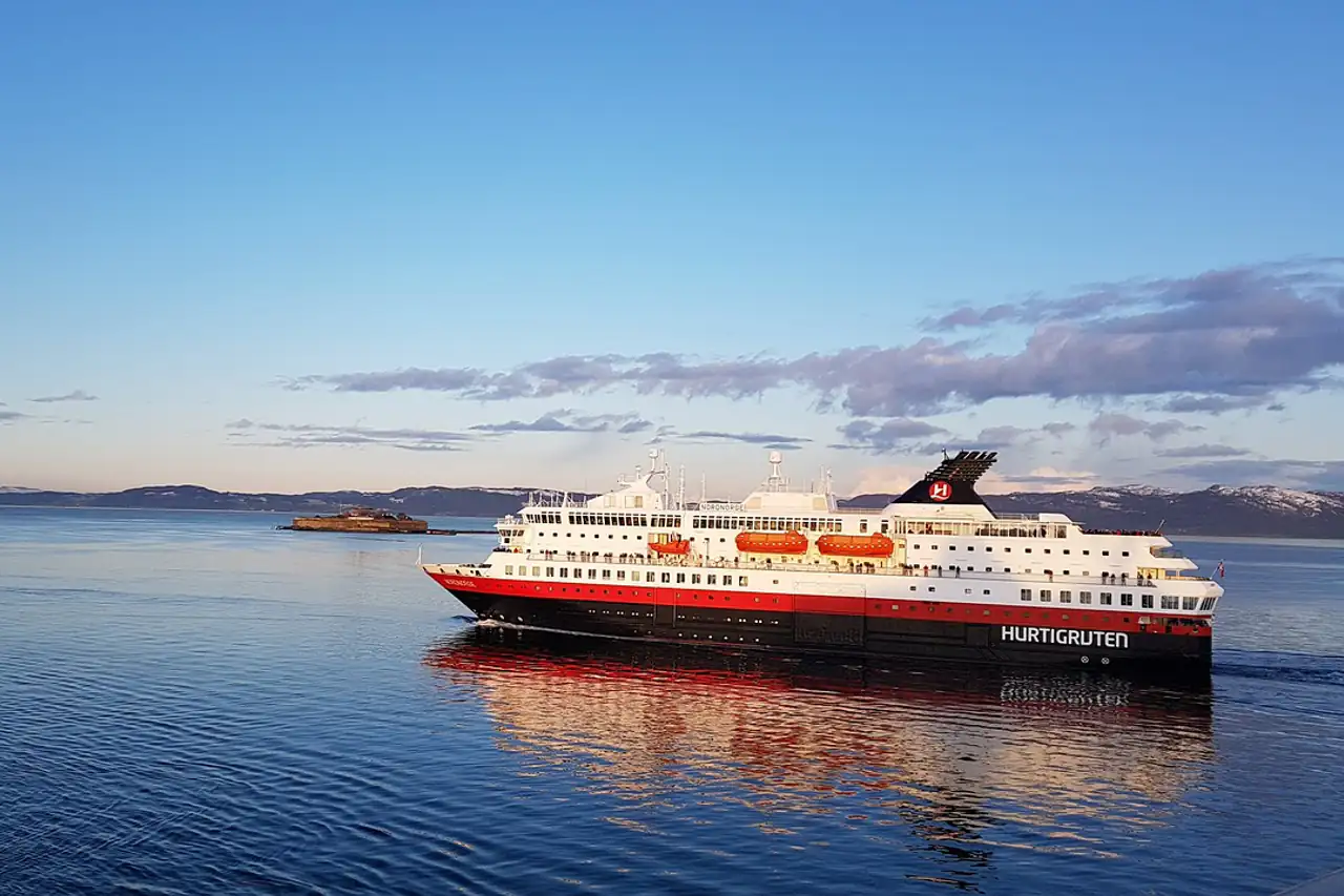 A coastal ship sailing in calm water