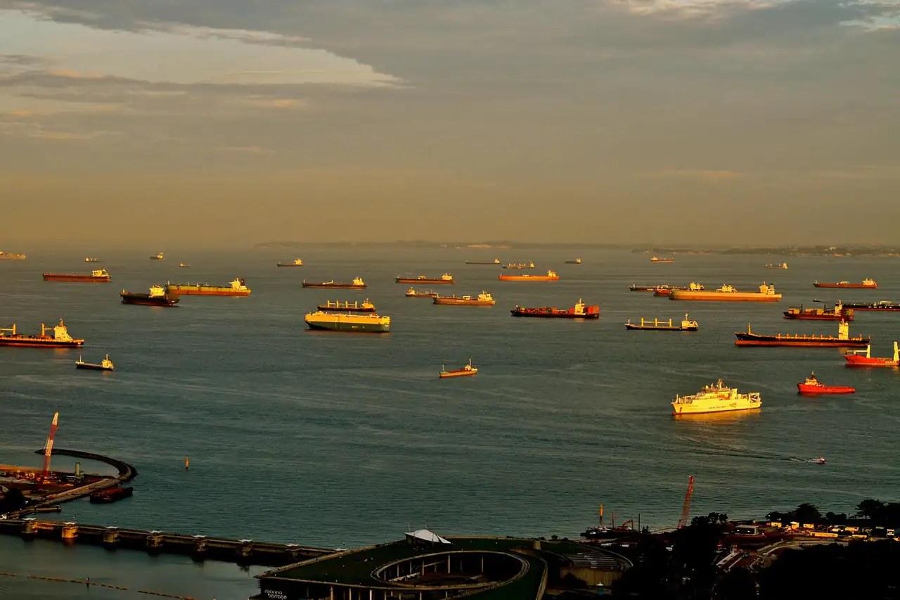 Many ships anchored offshore