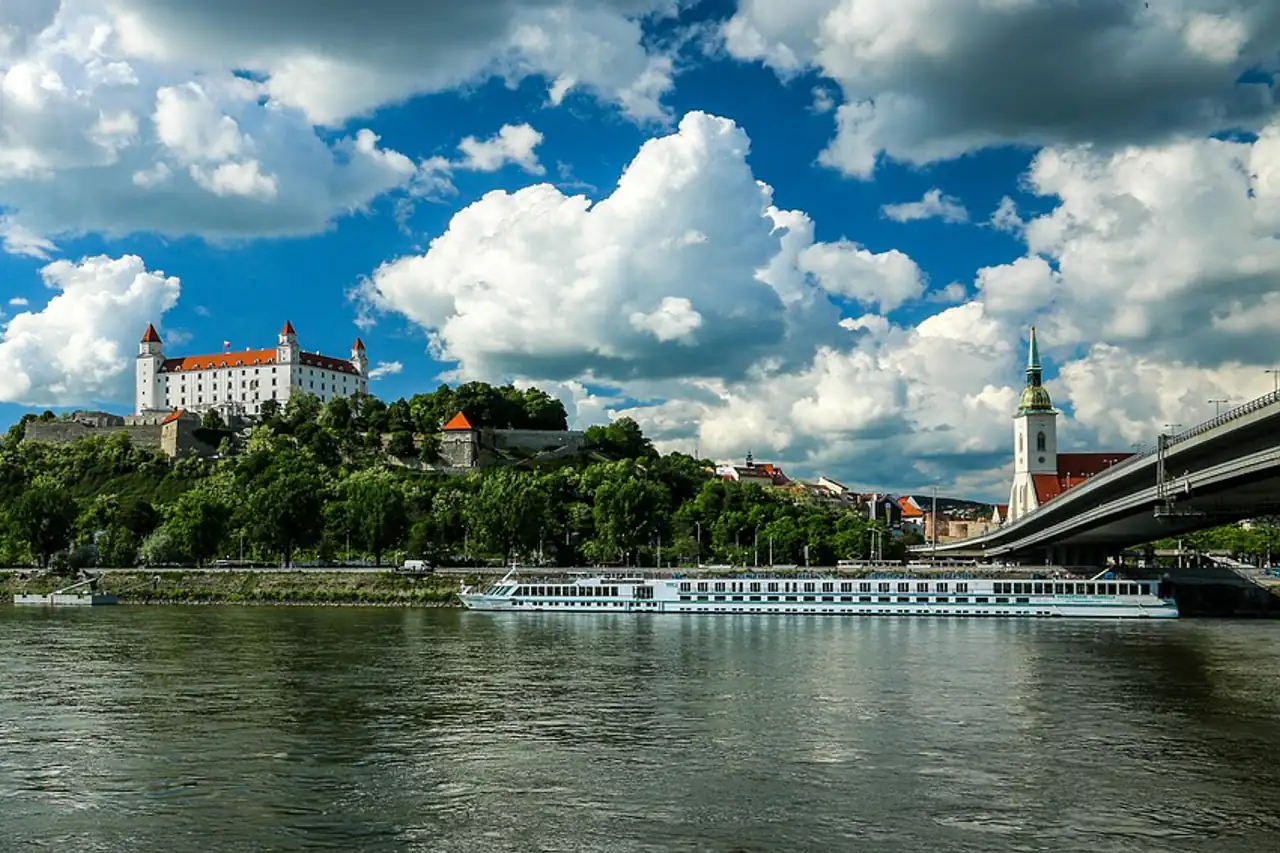 A castle above a wide river
