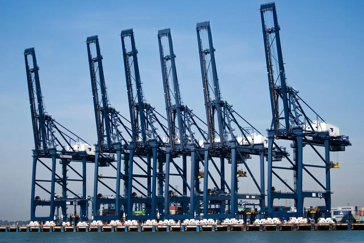 A row of container cranes on a quay