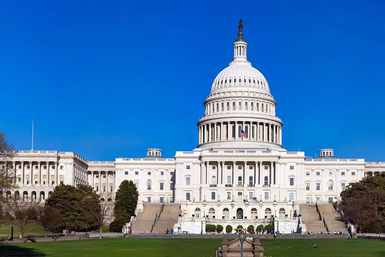 The US Capitol under a blue sky