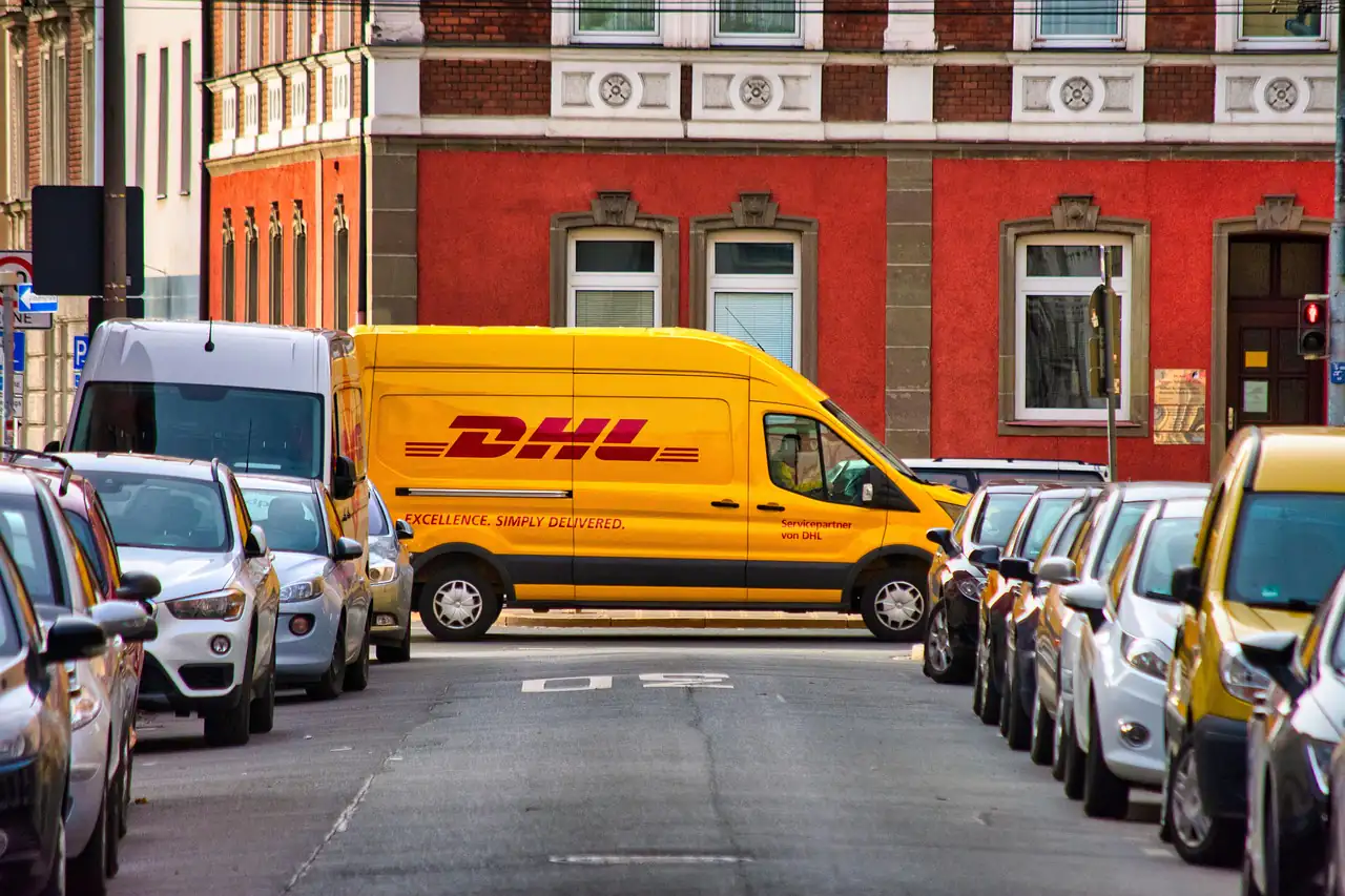 A delivery van parked on a city street