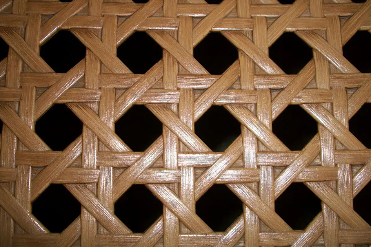 Woven cane in an open hexagonal pattern