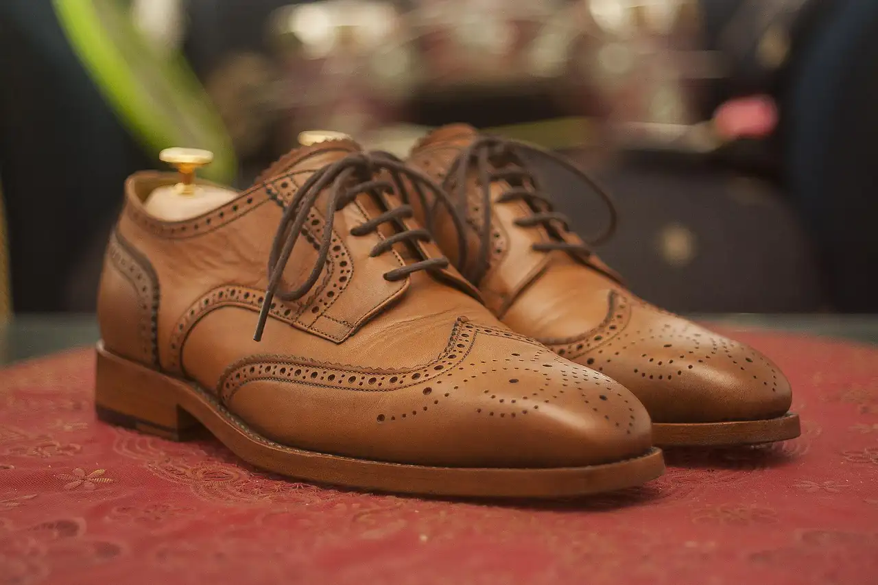 A pair of tan leather brogues