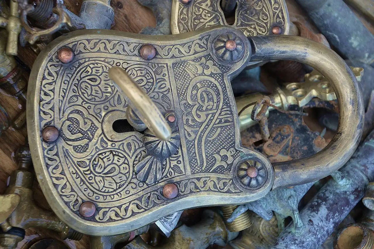 An old engraved brass padlock