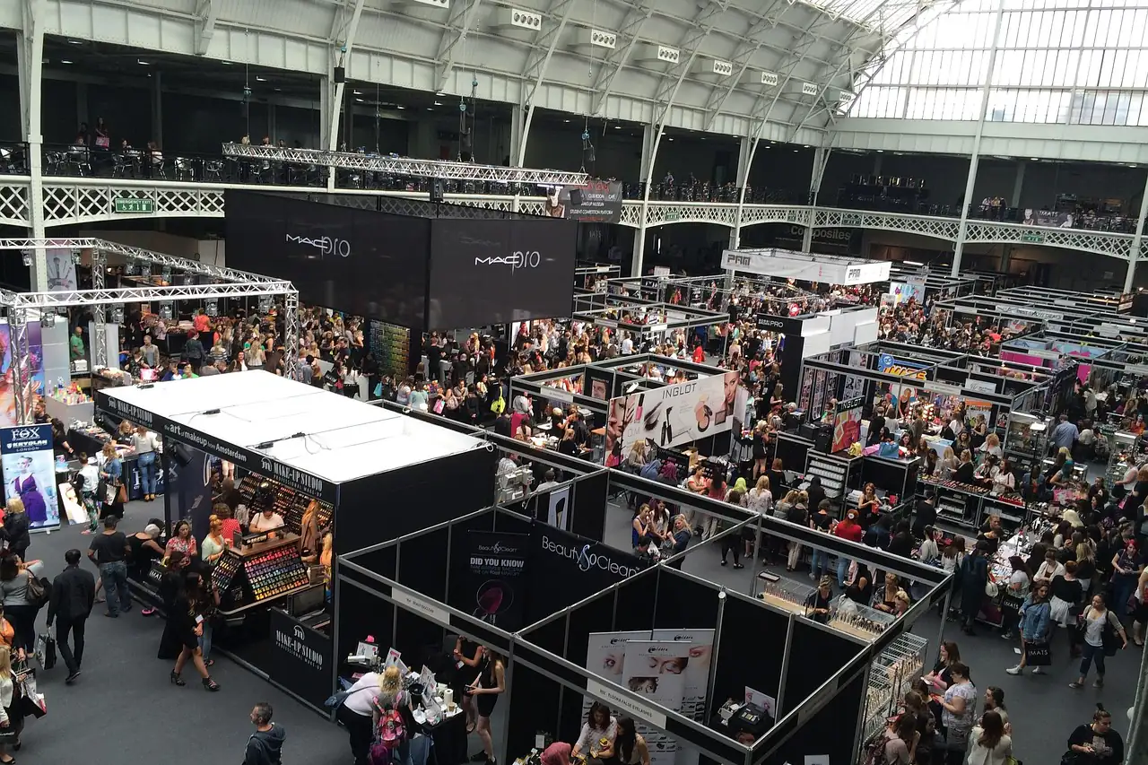 Crowded aisles and stands in a trade exhibition hall