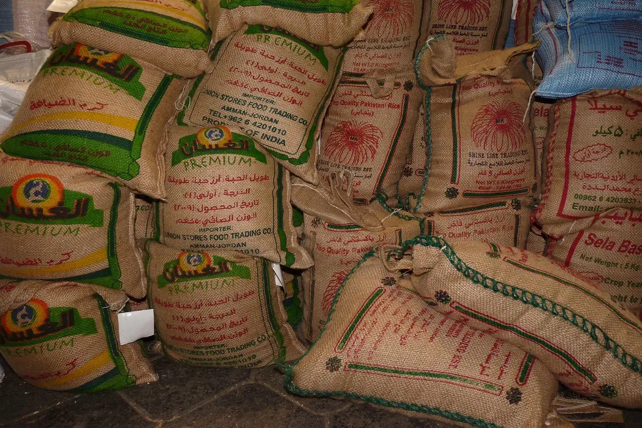 Piled sacks of goods at a wholesale market