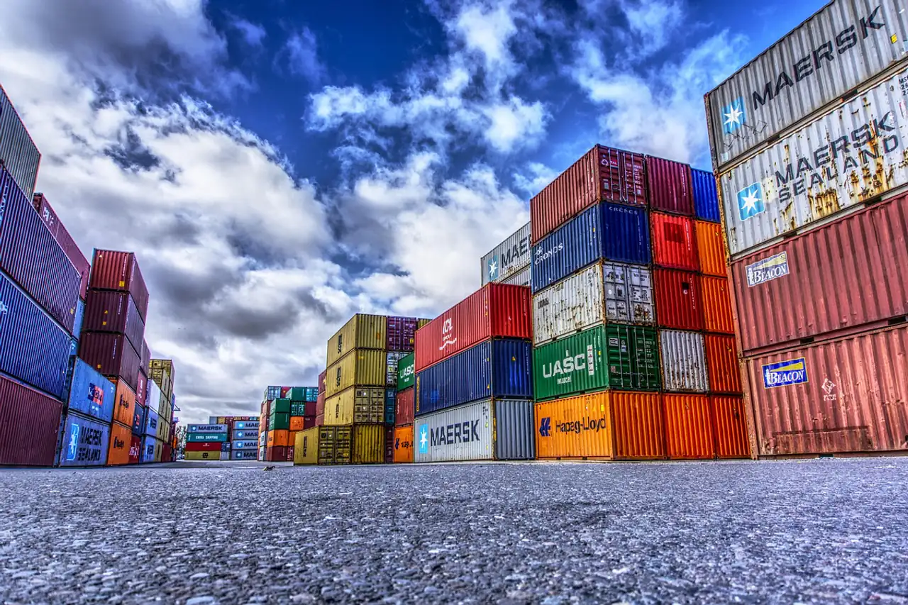 Stacks of shipping containers at a container yard