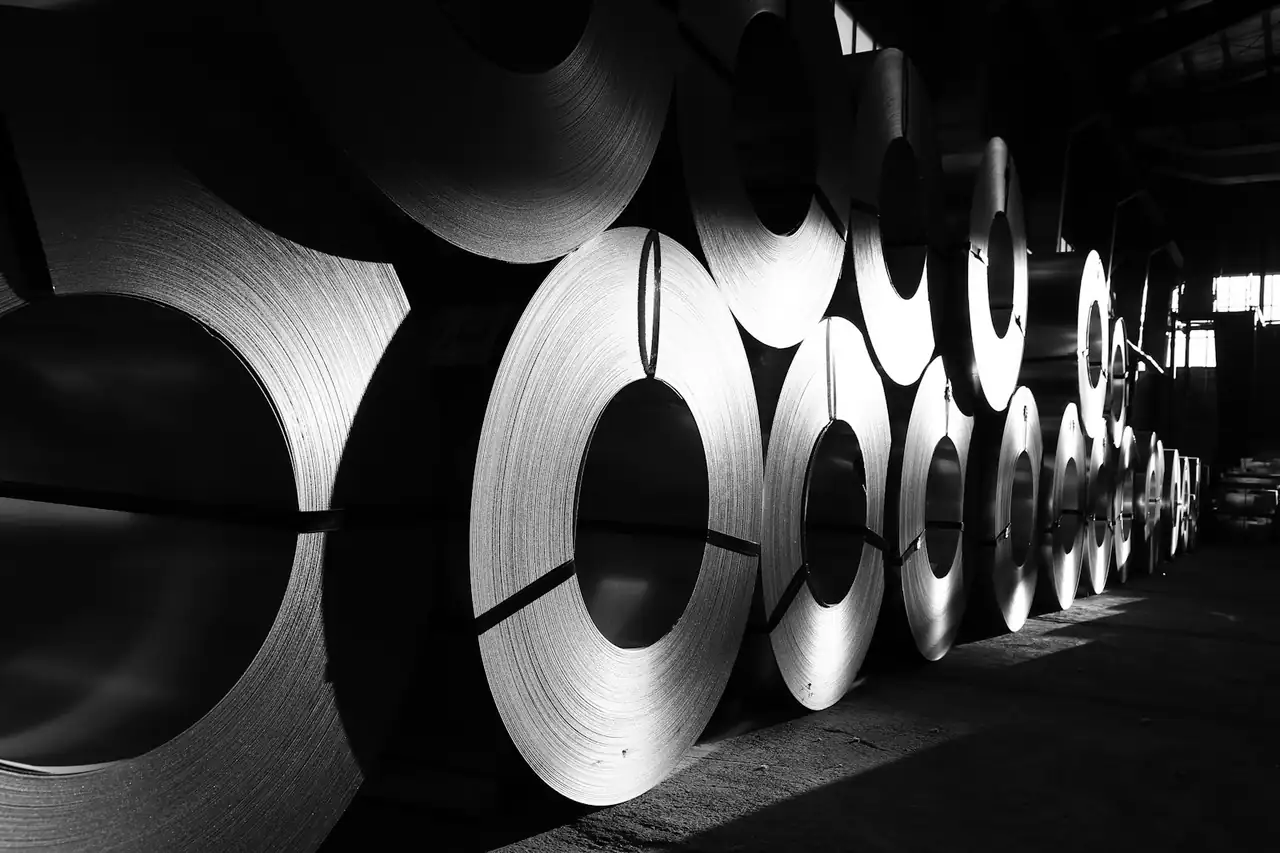 Rolled steel coils stacked in a store