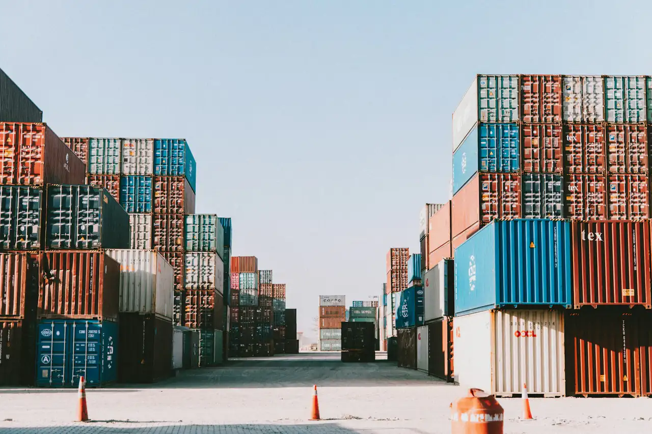 Rows of stacked containers in a yard