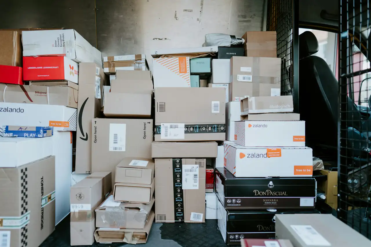 Parcels piled high in a sorting room